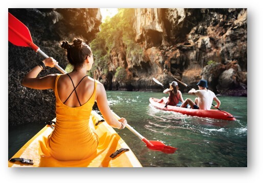 people kayaking through a gorge, representing a sporty silent auction item